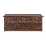 A 17th century cyprus-wood and pen-decorated boarded chest, Northern Italy