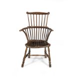 A beech and elm Windsor armchair, West Country, circa 1830 Traces of historic green-paint