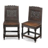 A pair of Charles II oak backstools, Cheshire, circa 1670 (2)