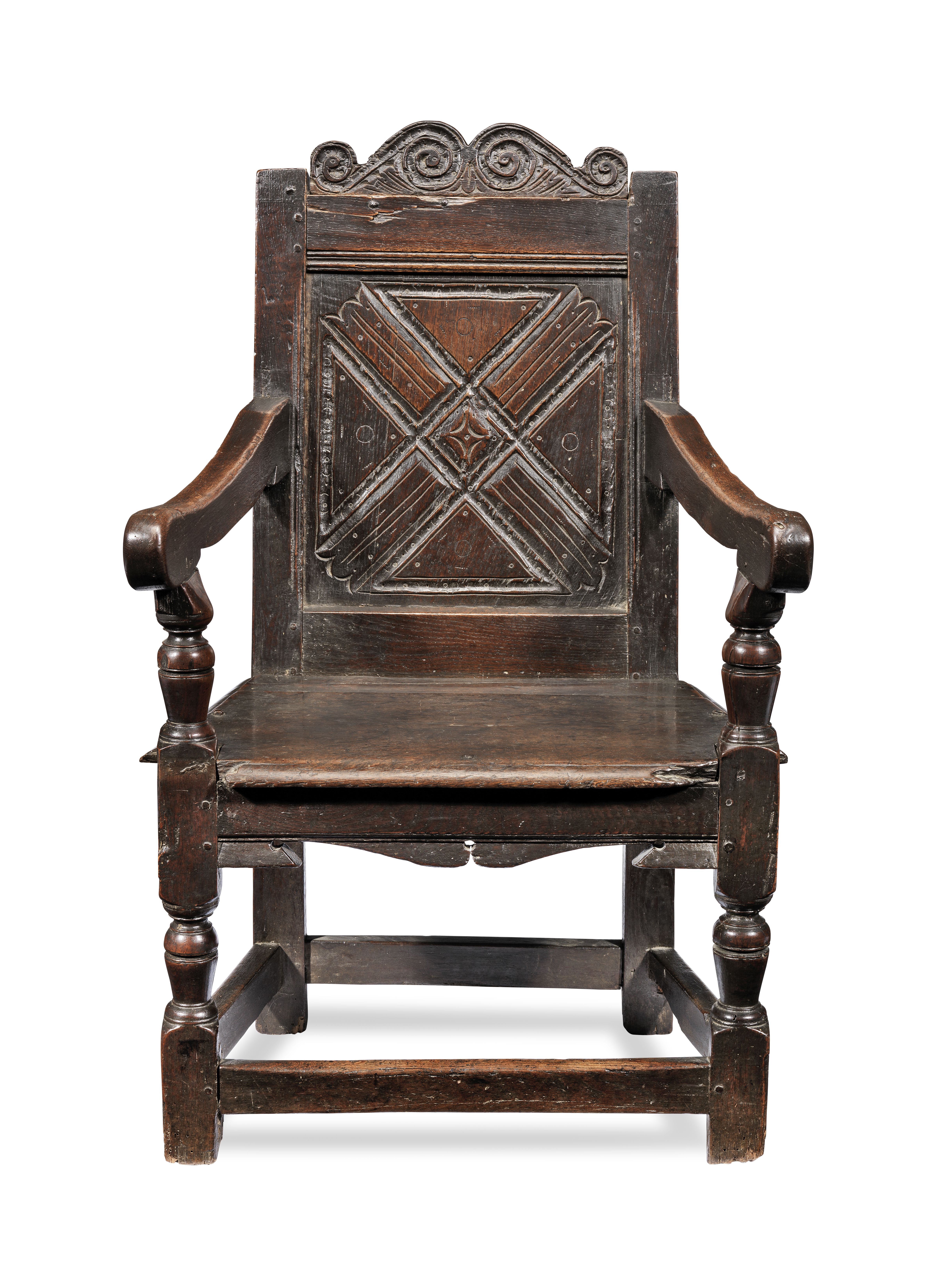 A Charles I joined oak panel-back open armchair, West Country, circa 1630