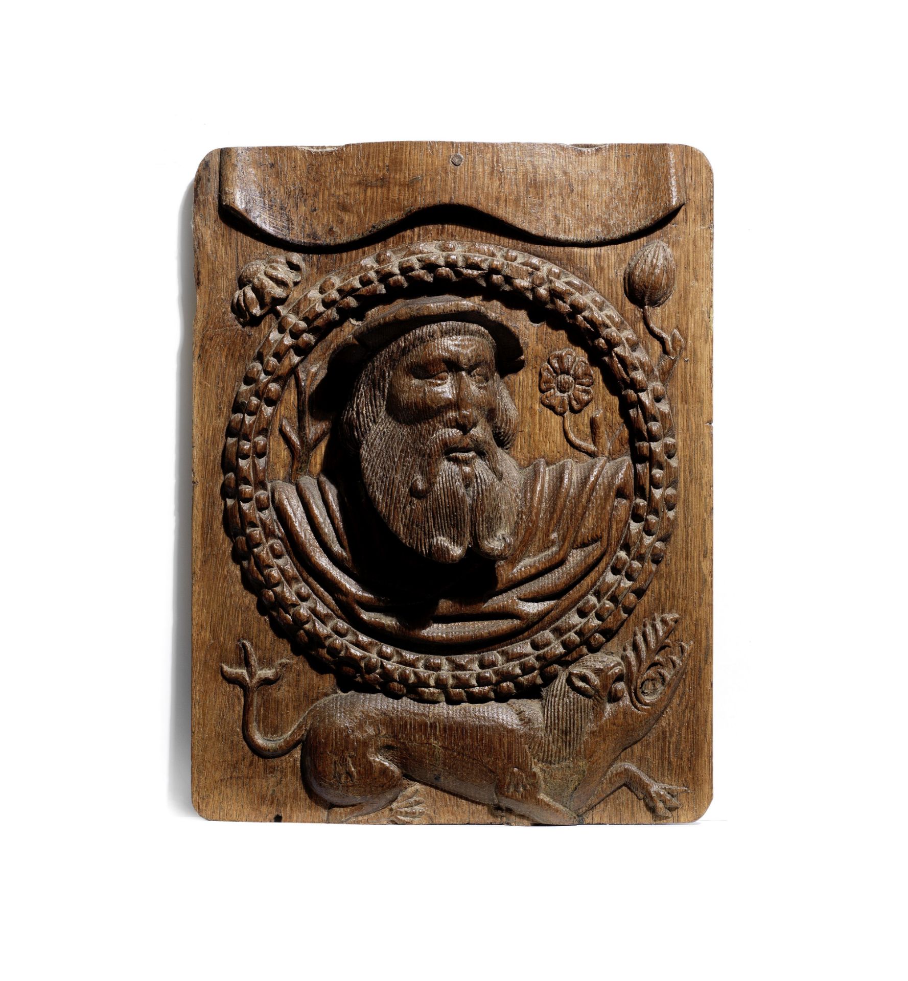 A good Henry VIII carved oak Romayne-type panel, circa 1530-40