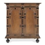 A late 17th century joined oak and ebonized standing cupboard, Dutch, circa 1670