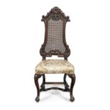 An early 18th century walnut and cane high-back side chair, Dutch, circa 1725