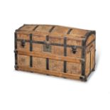 A Victorian leather, oak and iron bound dome-lidded carriage trunk, circa 1870