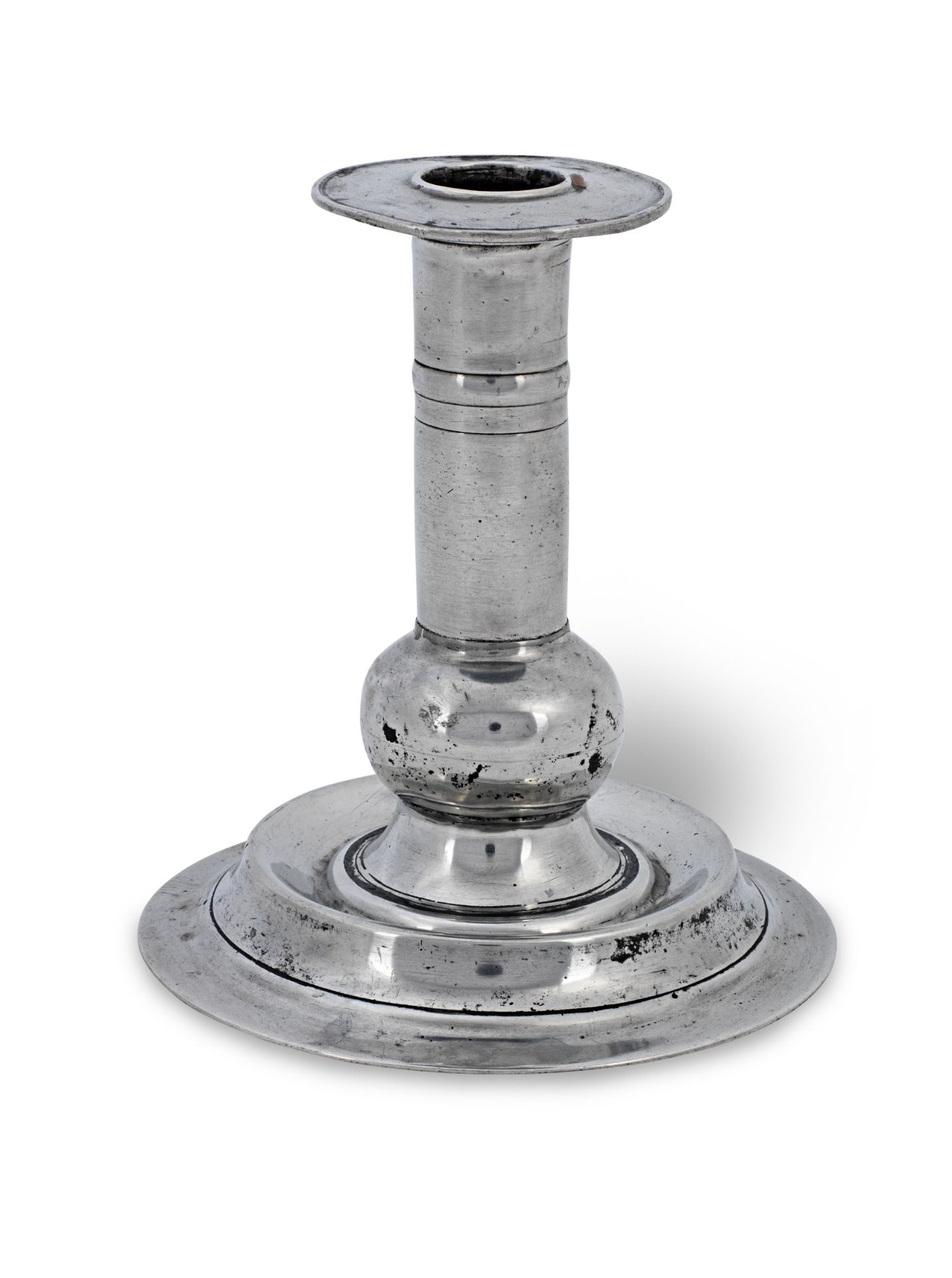 A 17th century pewter ball-knopped candlestick, circa 1650-75