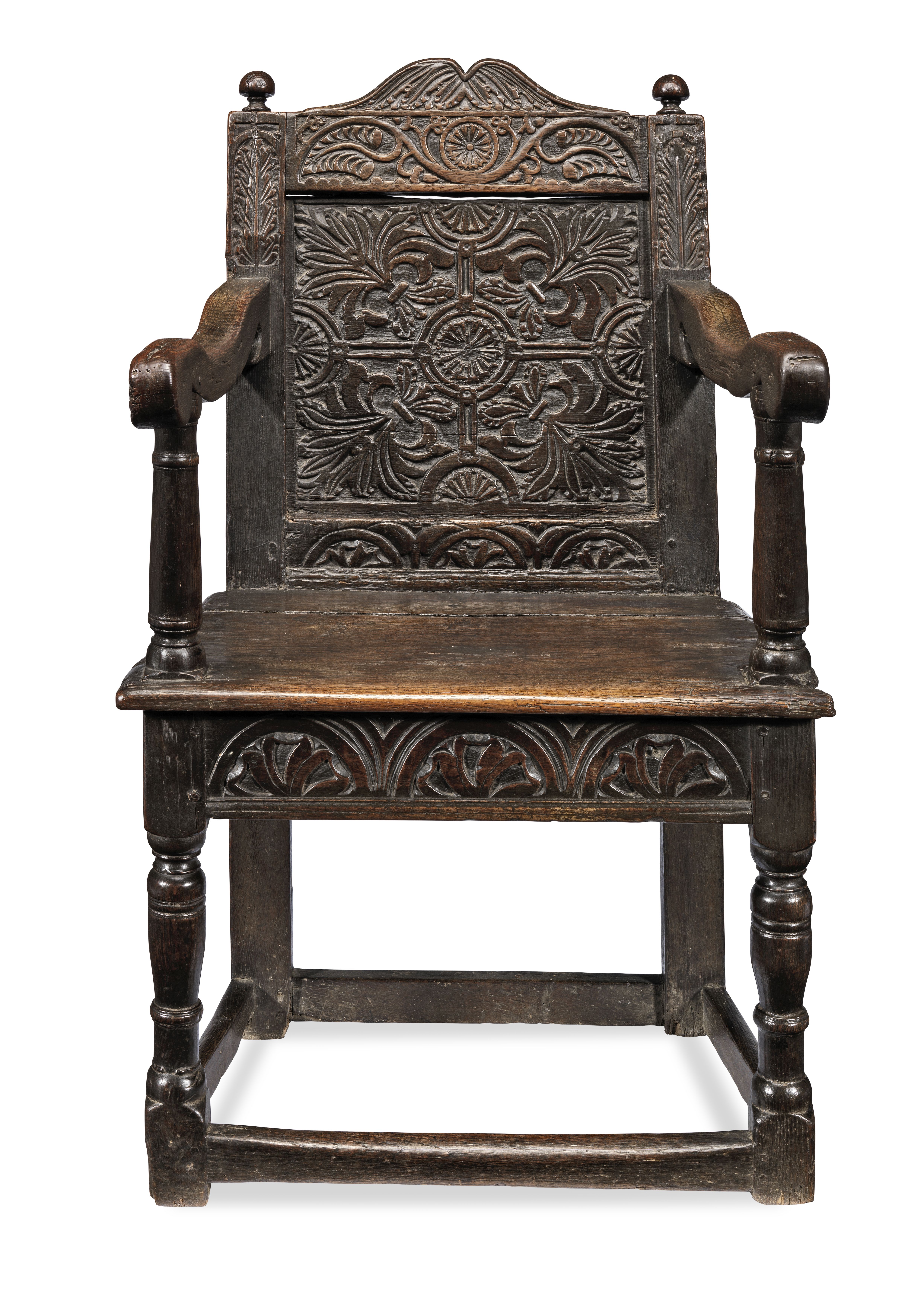A good Charles I joined oak panel-back open armchair, West Country, circa 1630