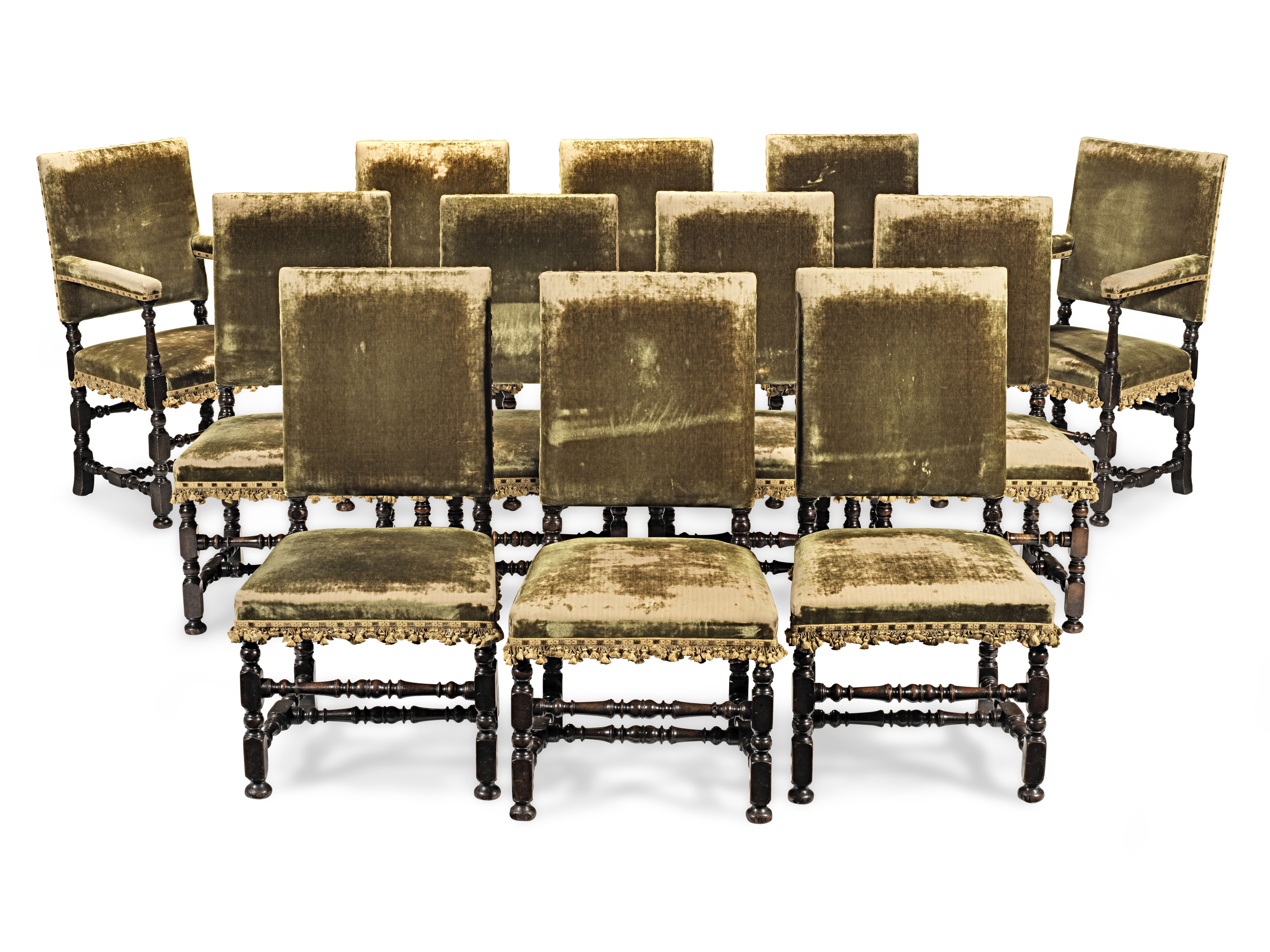 A set of eight joined walnut and upholstered dining chairs, French, circa 1700-40 (8+4)