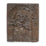 A 17th century carved oak panel, Flemish