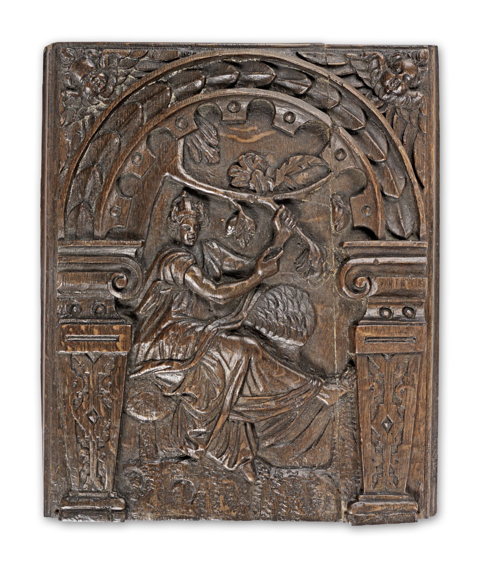 A 17th century carved oak panel, Flemish