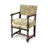 A late 17th century walnut and upholstered open armchair, Flemish