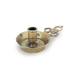 A rare late 17th century cast brass socket chamberstick, with porringer-type handle, English, cir...