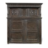 An Elizabeth I/James I joined oak press cupboard, circa 1600-20