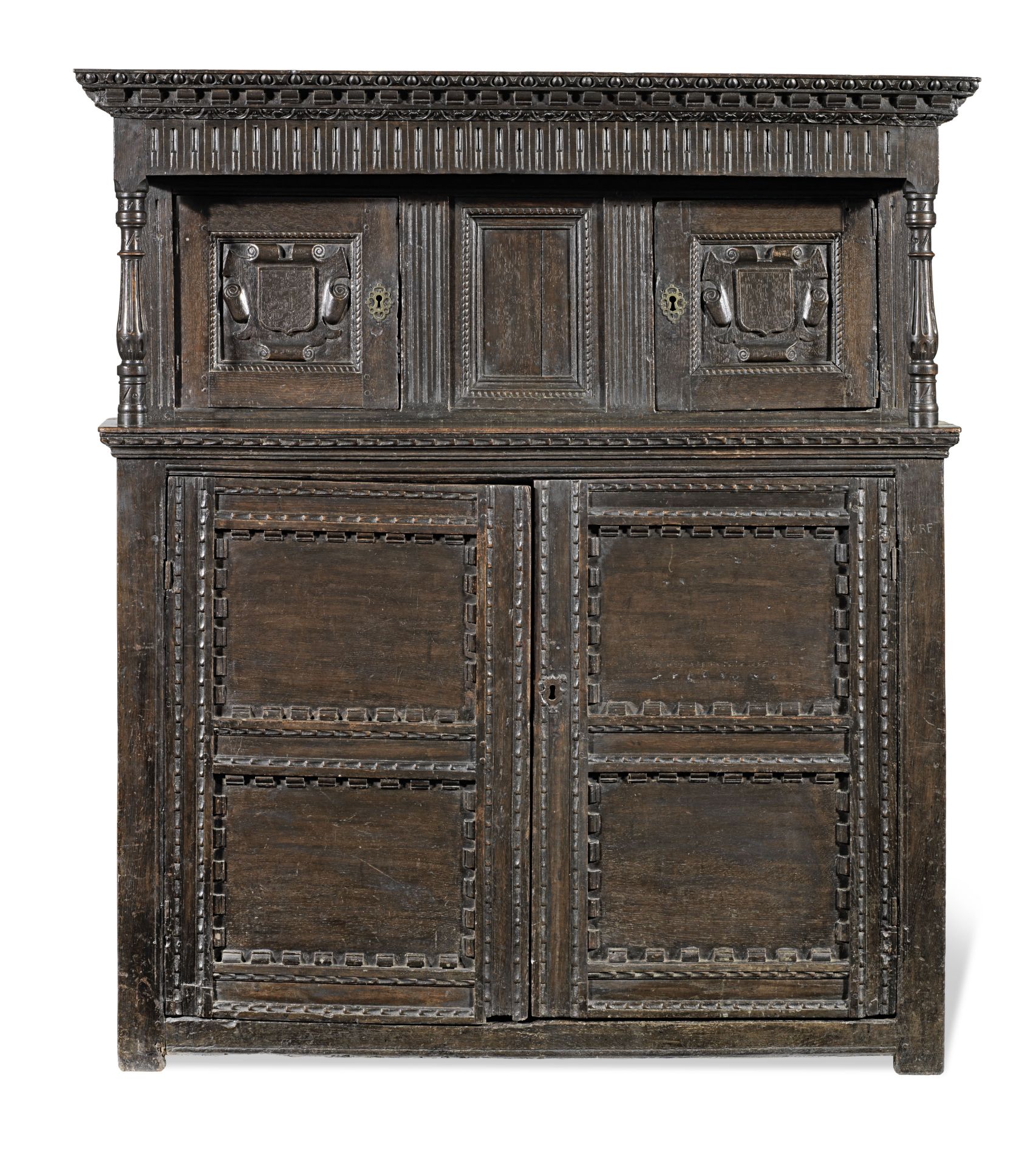 An Elizabeth I/James I joined oak press cupboard, circa 1600-20