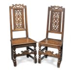 A pair of joined oak backstools, Lancashire, circa 1700 (2)