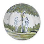 A Bristol delftware Adam & Eve charger, circa 1750