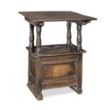 A late 17th century joined oak box-seat table-chair, circa 1680