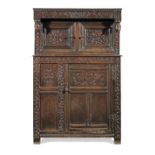 A small William III press cupboard, Trough of Bowland, Lancashire, dated 1698