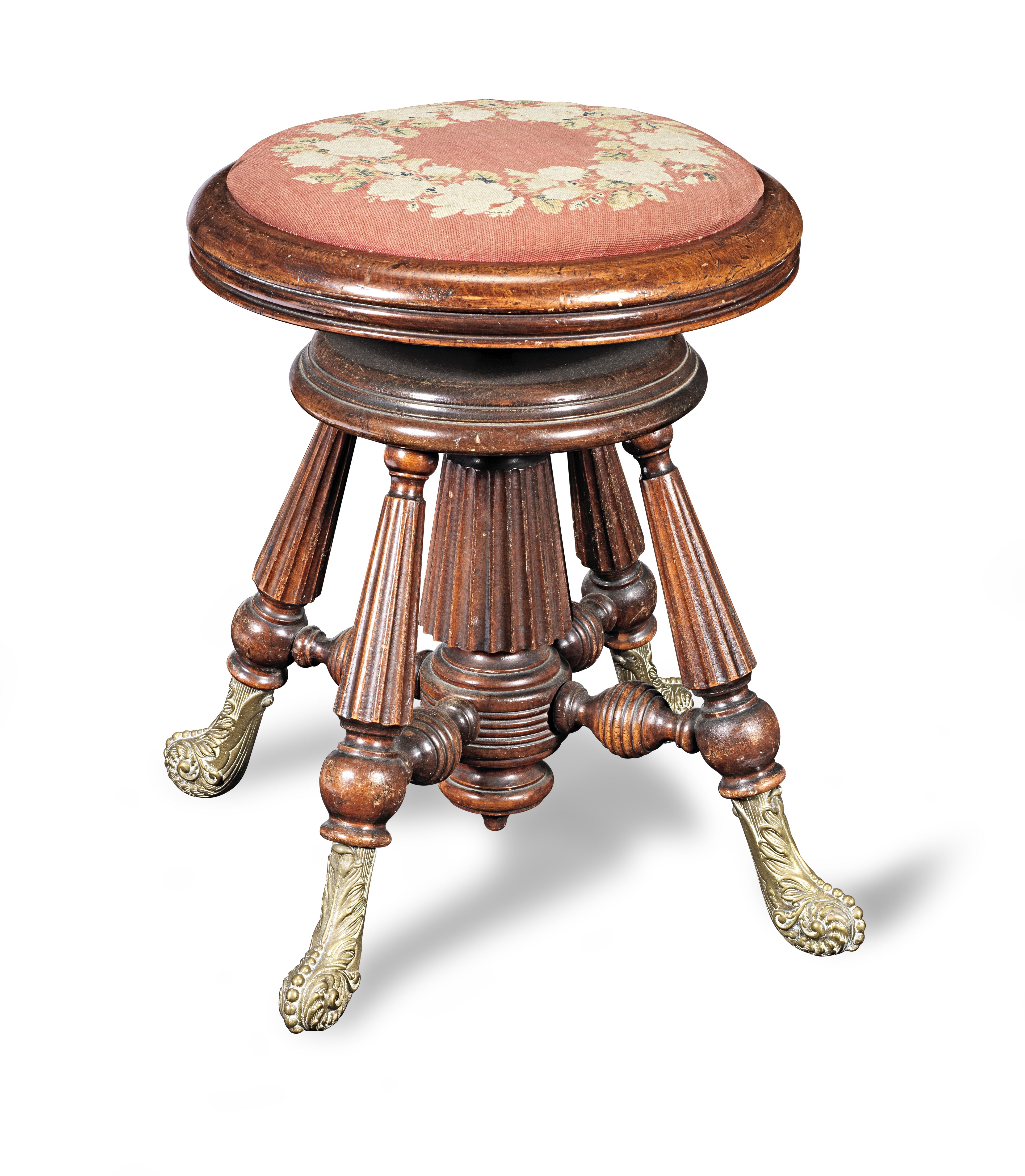 A Victorian stained-beech revolving piano stool, circa 1850