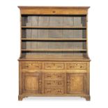 An early 19th century fully-enclosed joined oak and pine high dresser, circa 1830
