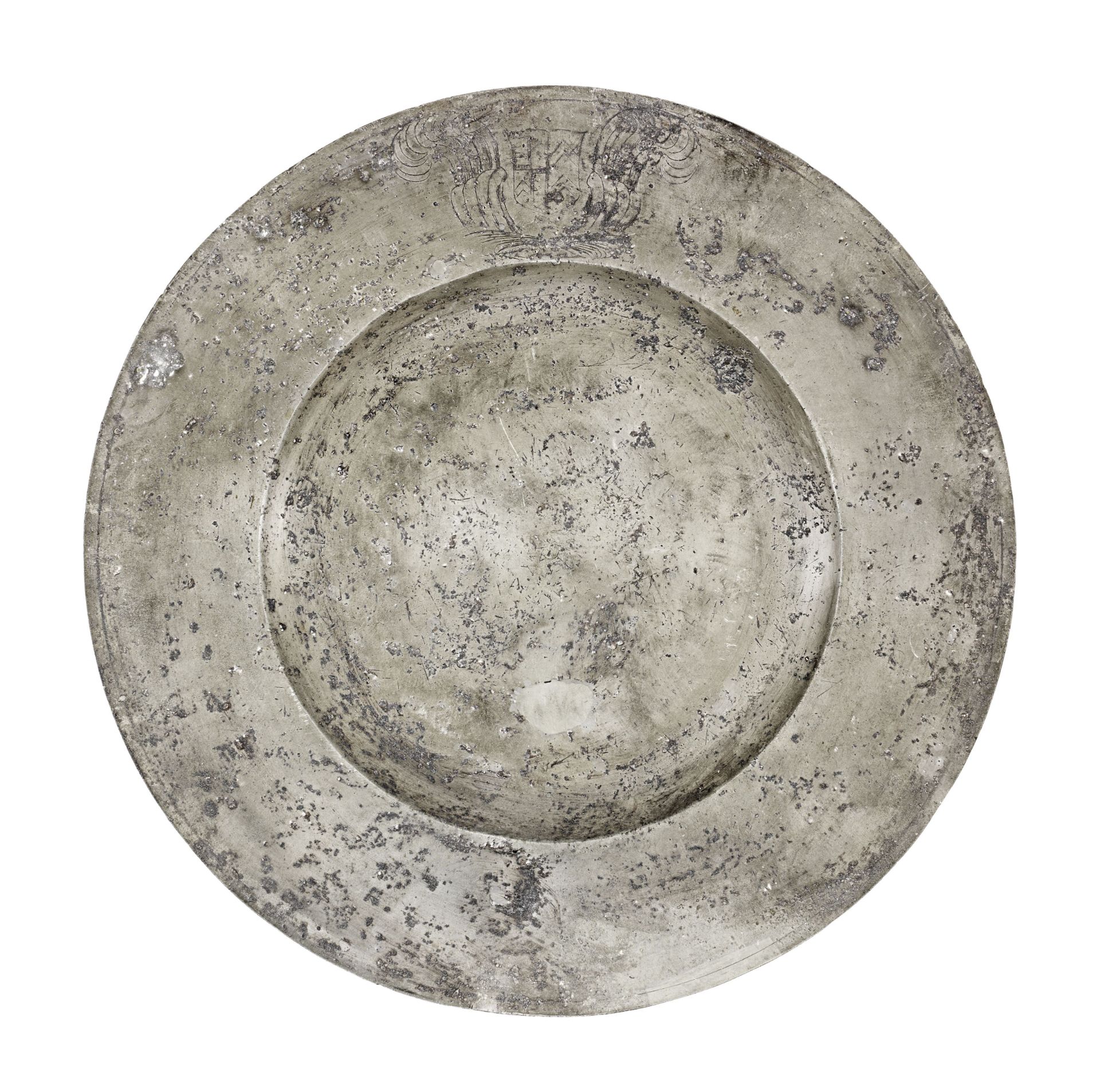 An impressive Charles II pewter broad rim charger, circa 1670