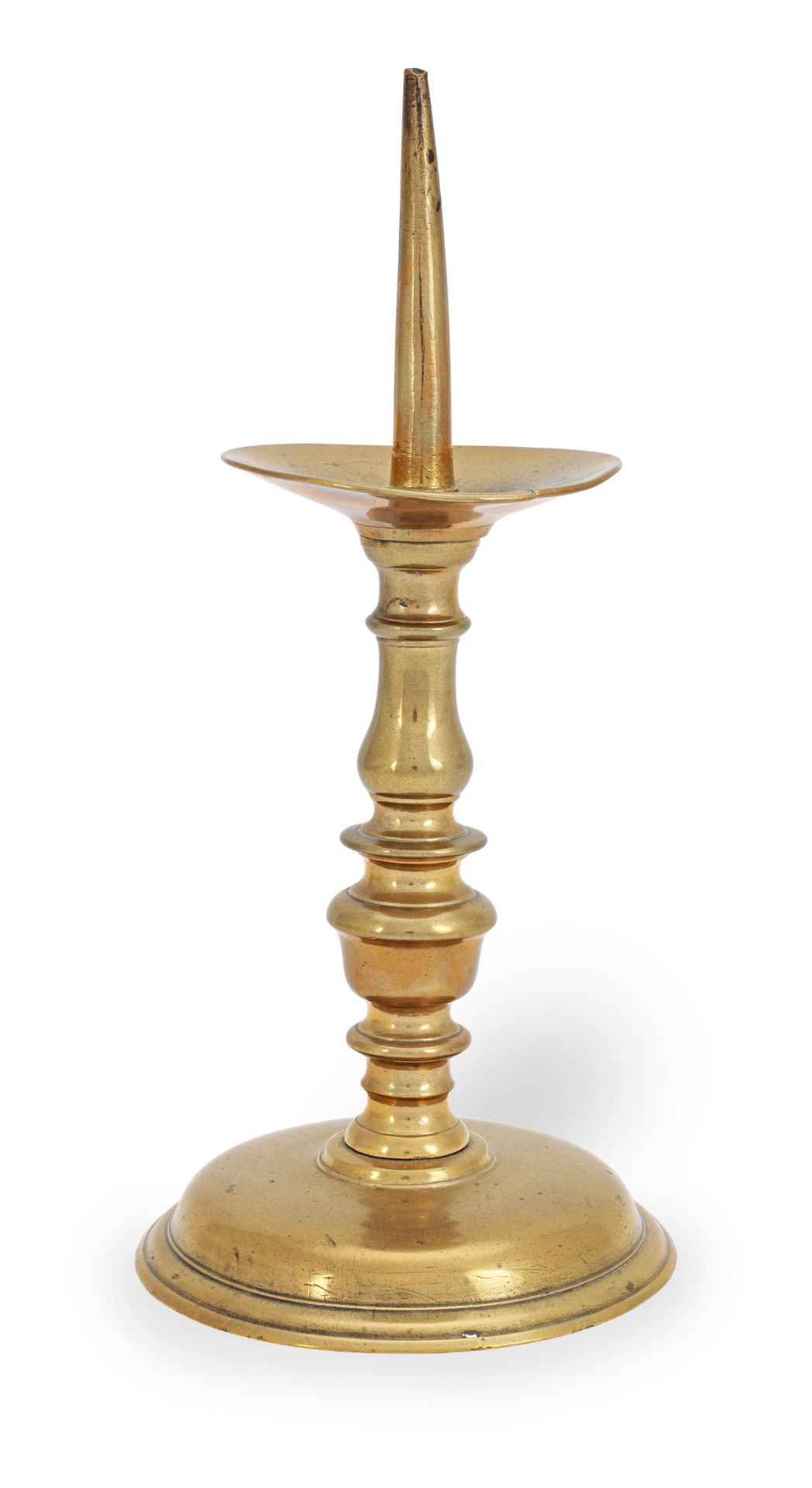 A 17th century brass pricket candlestick, North-West European, possibly French