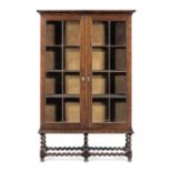 A walnut and fruitwood bookcase, in the late 17th century manner