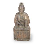 A 17th/18th century carved and polychrome-painted figure of a Buddha