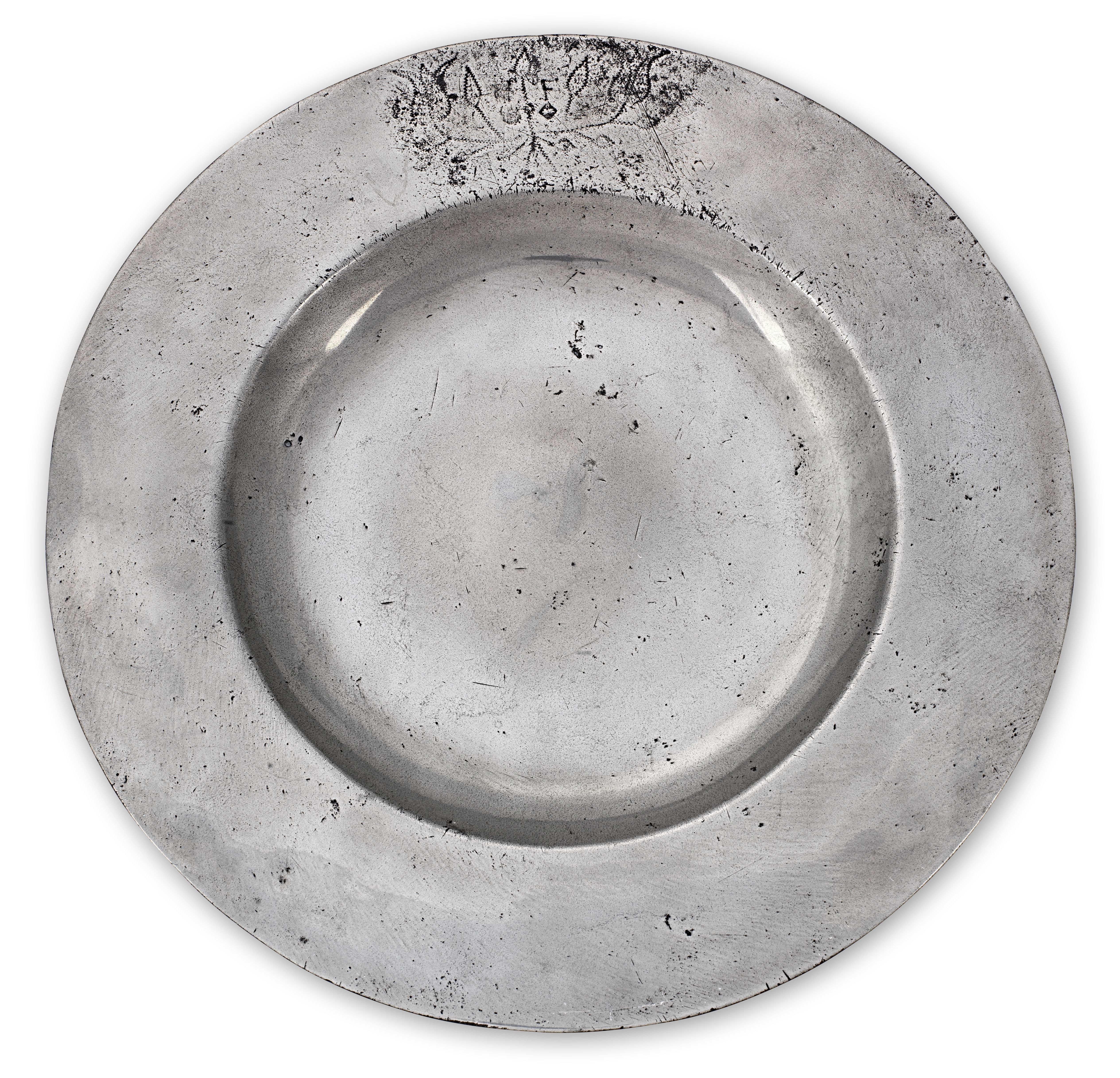 A Charles II pewter plain broad-rim plate, circa 1675 (11&#8542;in diameter, rim 2in, (34%))