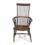 A Victorian ash, fruitwood and elm comb-back armchair, Thames Valley, circa 1830-60