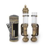 A pair of late 19th/early 20th century brass and glass candle lamps, marked 'GNR' for the Great N...