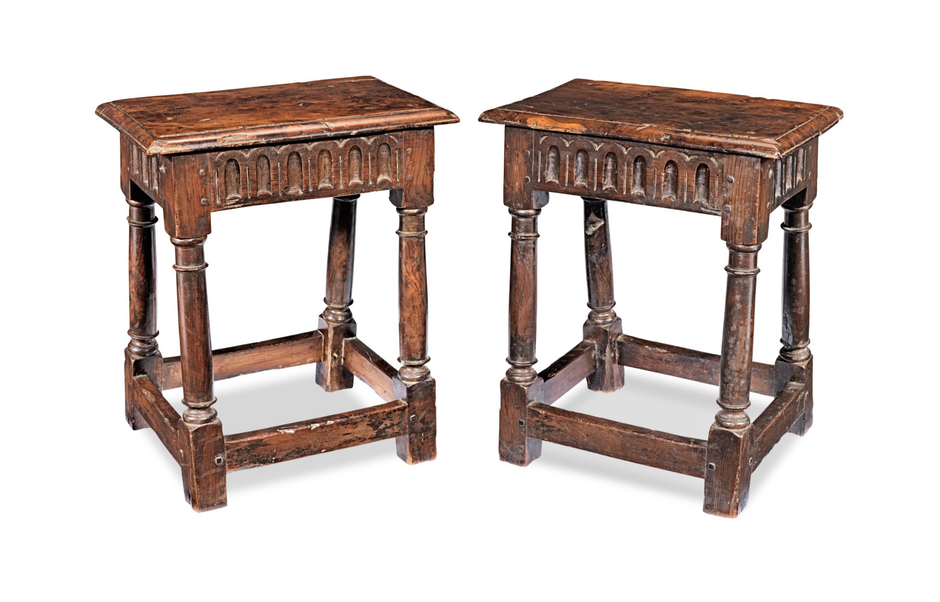 A pair of Charles I style yew-wood joint stools (2)