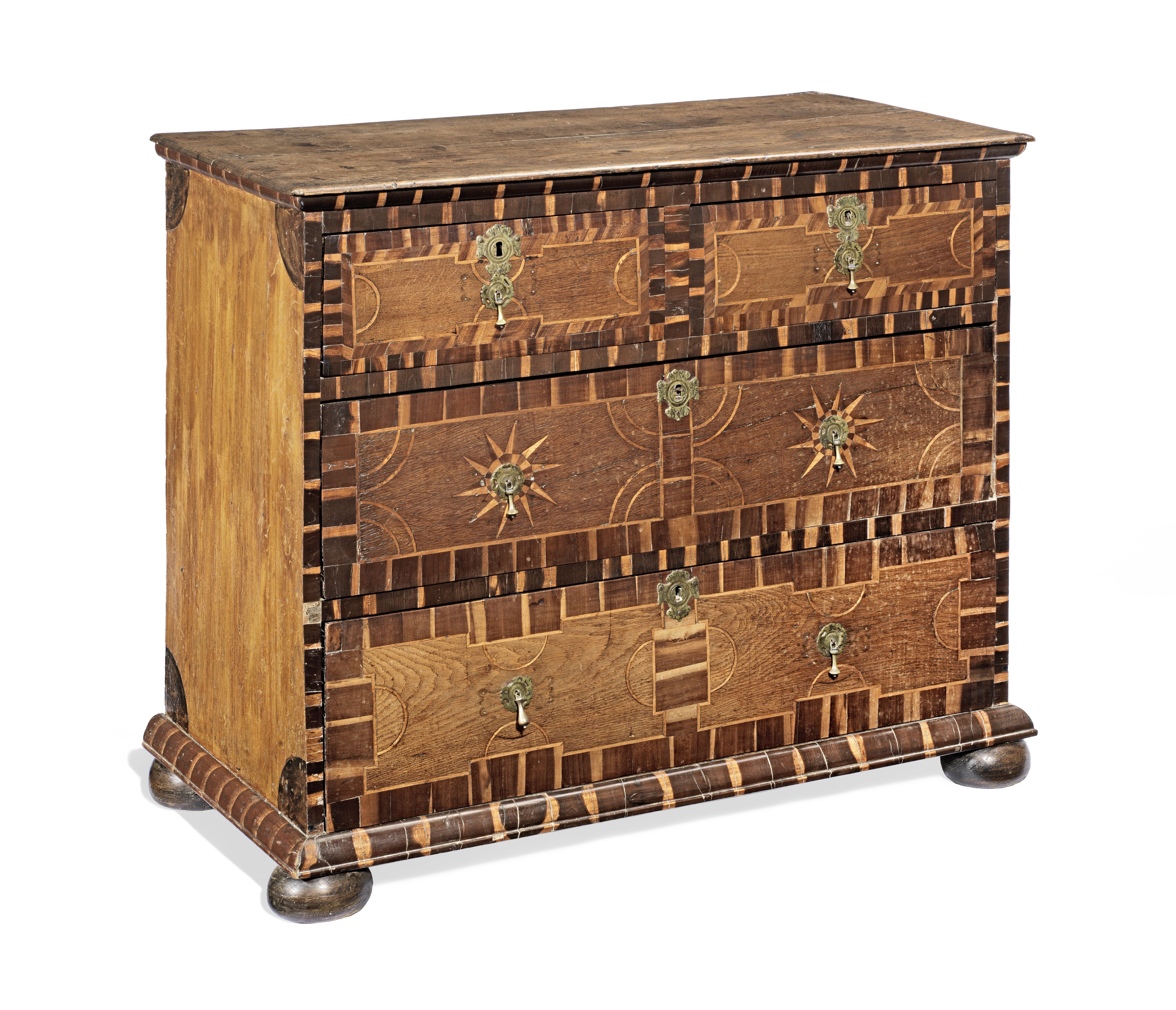 An unusual early 18th century oak, fruitwood, laburnum, inlaid and scumble-painted chest of drawe...