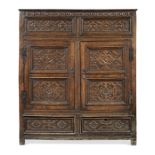 A Charles I joined oak livery cupboard, circa 1640