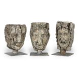 Three large carved grotesque heads, probably 17th/18th century (3)