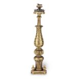 An 18th century floor-standing giltwood torchere, North Italian