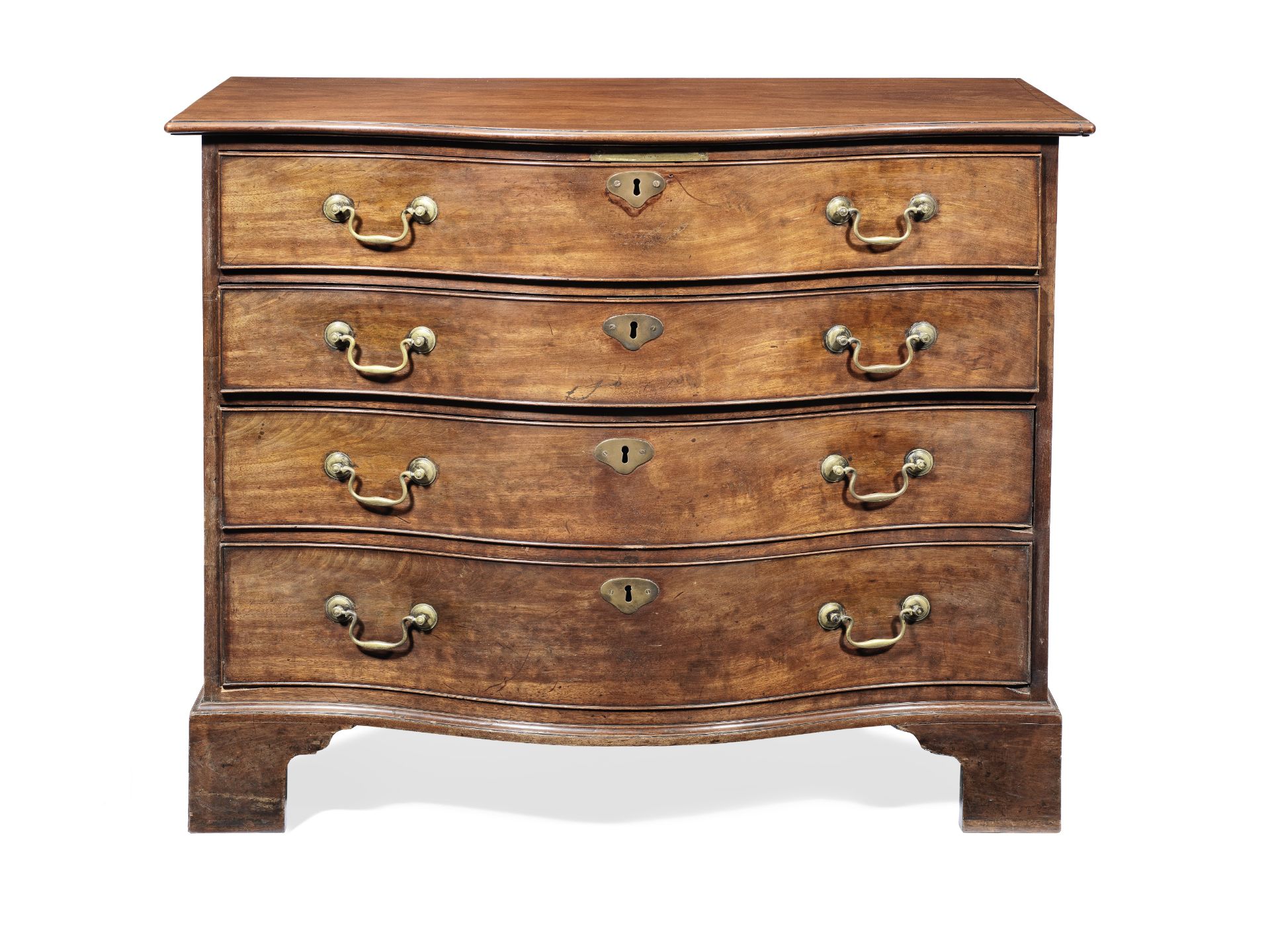 A George III mahogany serpentine secretaire chest