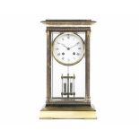 An early 20th century French gilt brass four glass clock the dial signed L'Epee