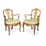 A pair of 18th century Italian provincial carved walnut open armchairs (2)