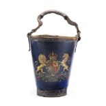 A 19th century painted leather fire bucket decorated with a Kings crown royal coat of arms