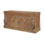 A large Austrian 'gothic revival' carved oak side cabinet