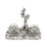 A silver-plated novelty inkstand seemingly unmarked, mid-19th century, the inkwell mounts Birming...