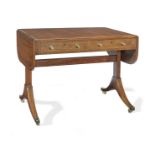 A Regency fiddleback mahogany and rosewood banded sofa table
