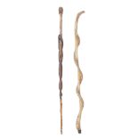 Of Aboriginal interest: Two snake carved wood walking sticks, probably early 20th century (4)