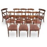 A set of eighteen mahogany and ebonised dining chairs in the Regency style (18)