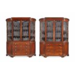 A pair of late George III mahogany breakfront display cabinets (2)