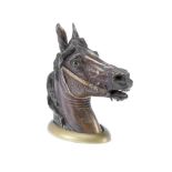 An early 20th century Austrian cold painted bronze equestrian inkwell formed as a horses head