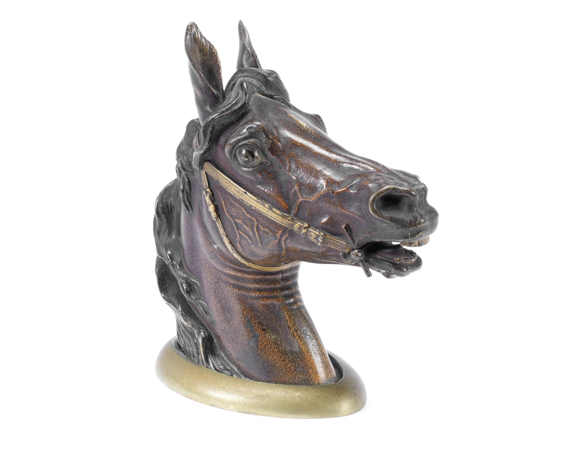 An early 20th century Austrian cold painted bronze equestrian inkwell formed as a horses head