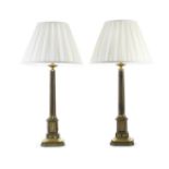 A pair of patinated and gilt metal lamp bases in the regency gothic style (4)
