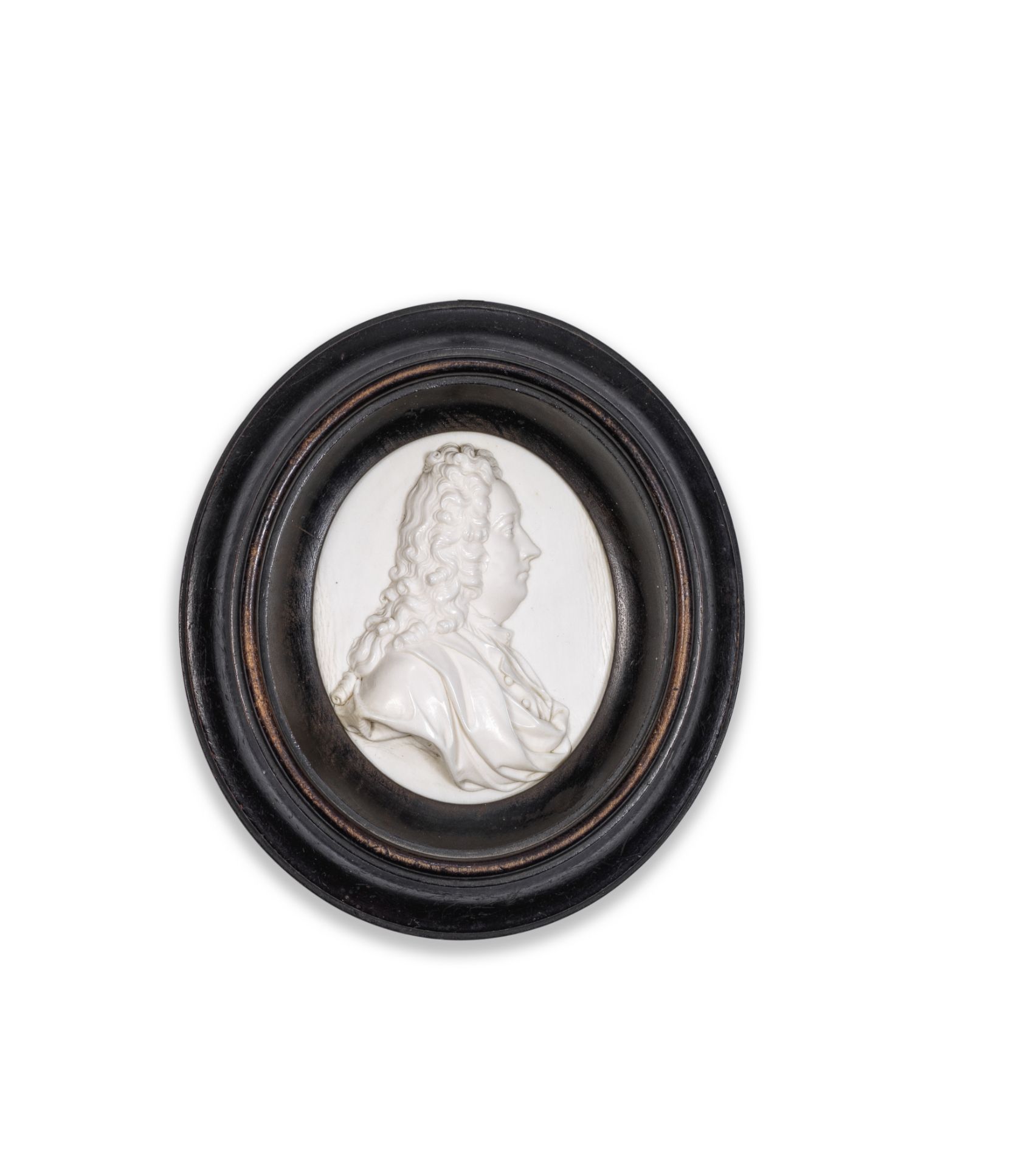 David Le Marchand (Anglo-French, 1674-1726): An early 18th century relief carved ivory oval portr...
