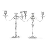 A pair of silver three-light candelabra Tessiers, London 1935 / 1938